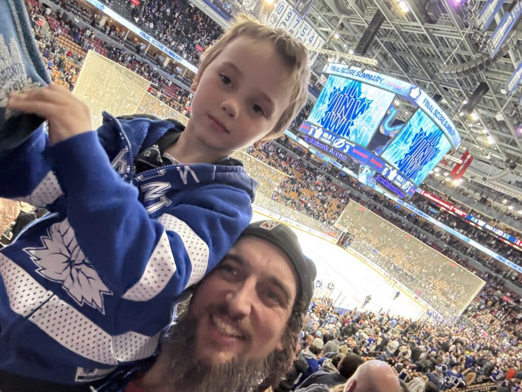 Evan Blackman and his son at a hockey game (Courtesy Evan Blackman)