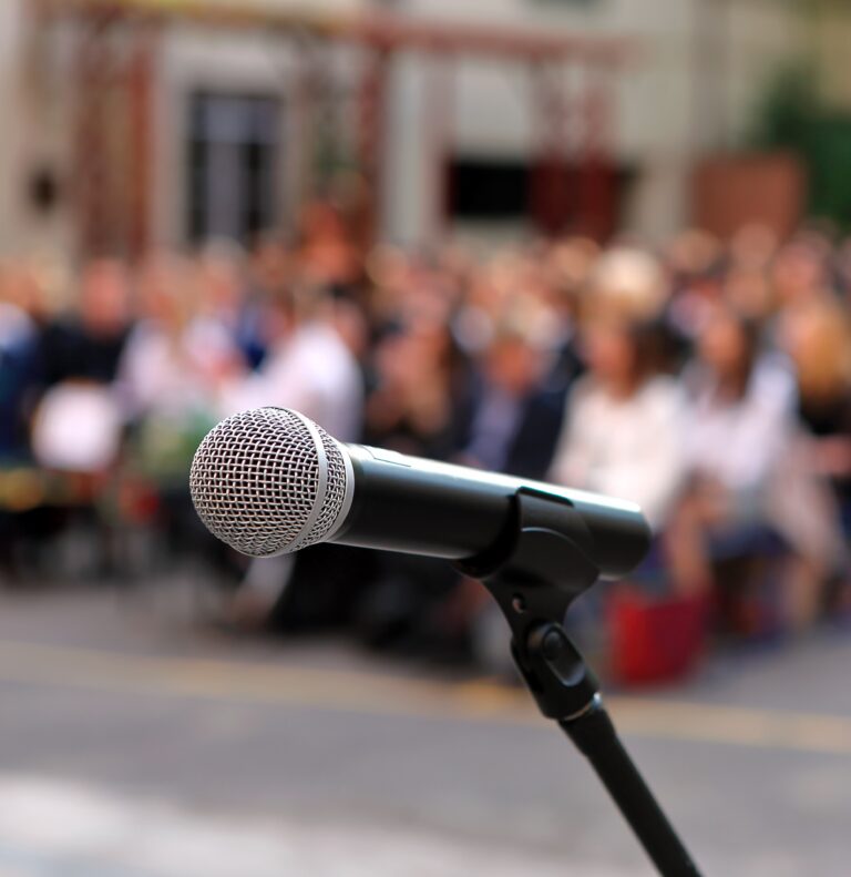 Mic at meeting/Adobe Stock