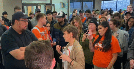 Dr. Widdowson speaks with protesters at the University of Lethbridge prior to the escalation of tensions surrounding her cancelled event (Courtesy of Global News)