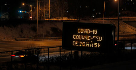 Covid curfew sign (Courtesy of Pascal Huot)